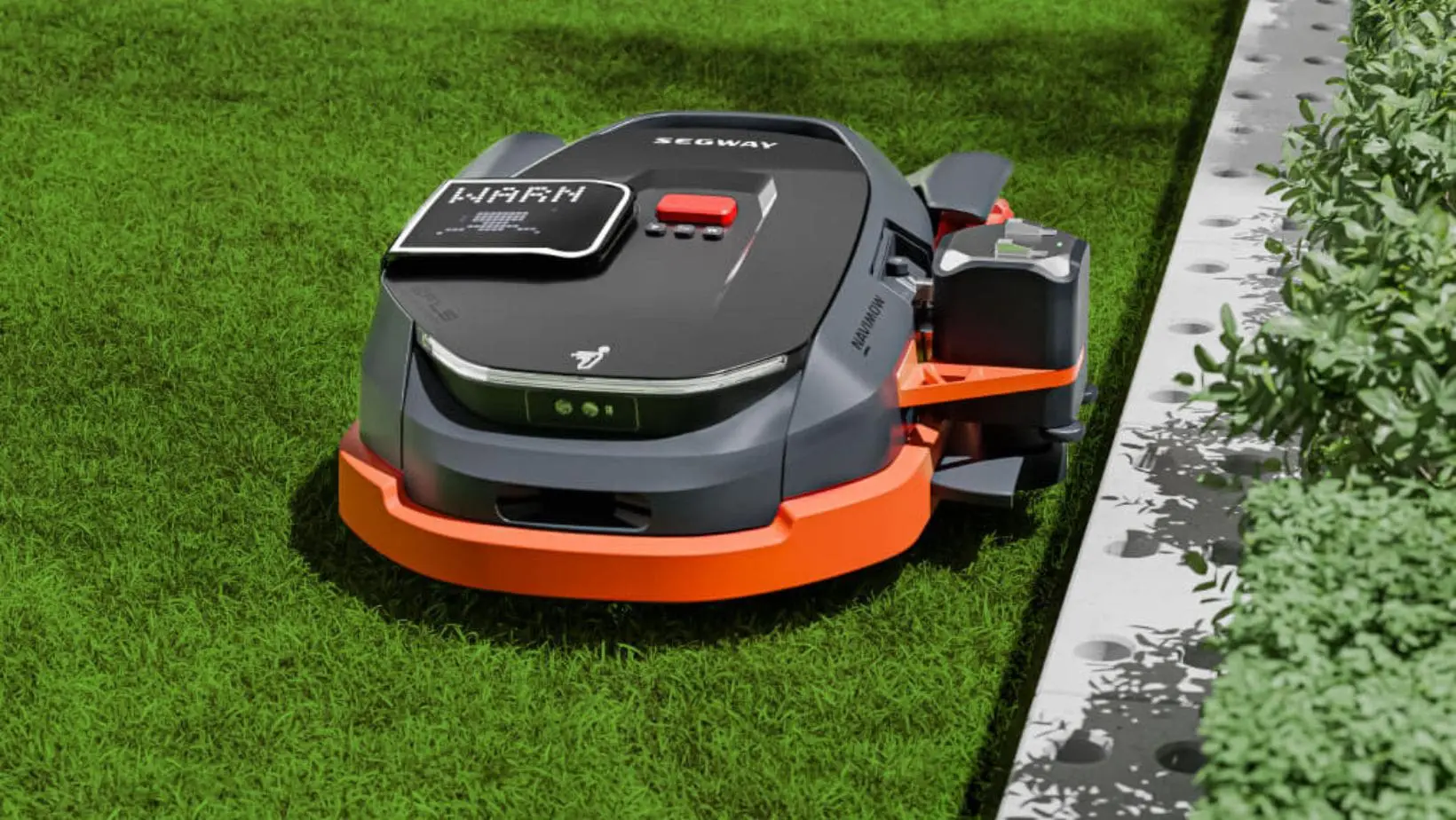 a Segway Navimow X3 Series Robotic Mower trimming the edge of a lawn