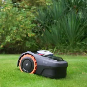 the Segway Navimow i108E Robotic Mower cutting a lawn
