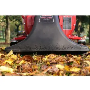 a vacuum collector gathering fallen leaves