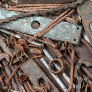 a lot of rusty tools, nuts and bolts