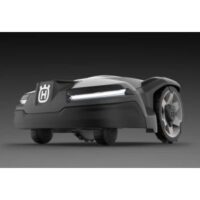 a Husqvarna Automower 415X against a grey background