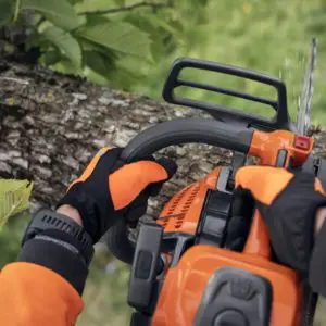 an operator's eye view of a chainsaw cutting a log