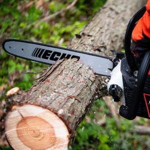 Echo chainsaw cutting through a log