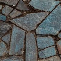 jagged pieces of slate on soil