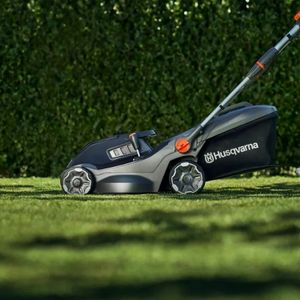 the Husqvarna Aspire™ LC34-P4A Mower on a lawn