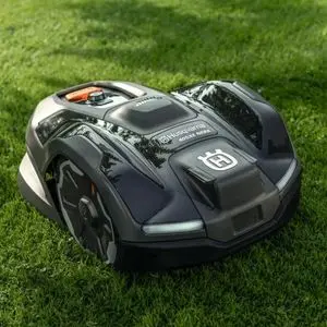 the Husqvarna Automower® 405XE NERA on a lawn