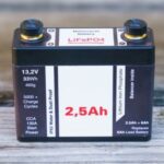 a 2.5Ah LiFePO4 battery on a wooden table