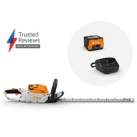 the STIHL HSA 60 Cordless Hedge Trimmer, a battery, charger, and sign reading 'Trusted Reviews Highly Recommended', all against a white background