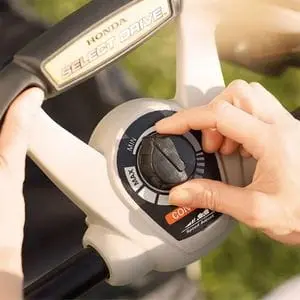 a close up of a Honda HRX petrol lawnmower's select drive setting dial