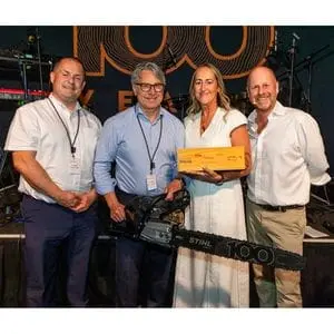 Garden Machinery Direct's Managing Director, Mark Smith, receiving the STIHL 100 Award and a STIHL MS 500i Centennial Edition Chainsaw at the STIHL 100 Awards Ceremony 