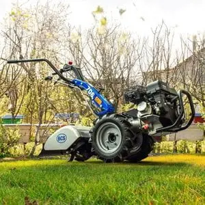 the BCS 706 PowerSafe® Two-Wheel Tractor parked on a patch of grass